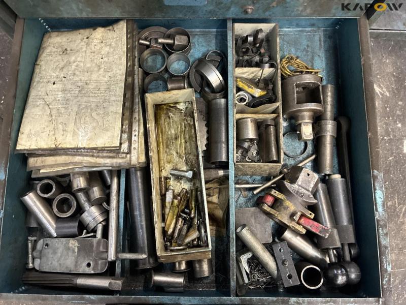 Workshop table with contents 29