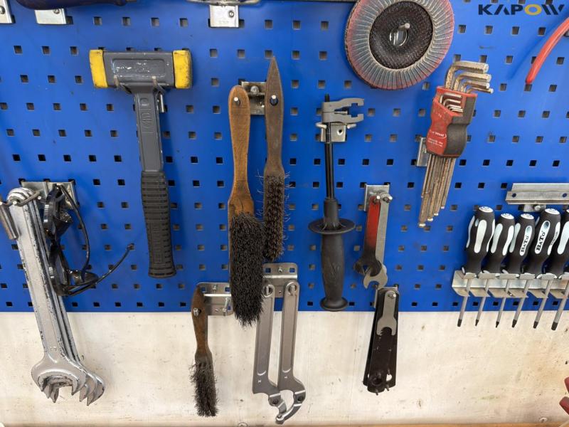 Workshop table with tools and blackboard 10