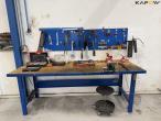 Workshop table with tools and blackboard 1