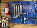 Workshop table and blackboard with tools 4