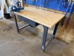 Workshop table and blackboard with tools 14
