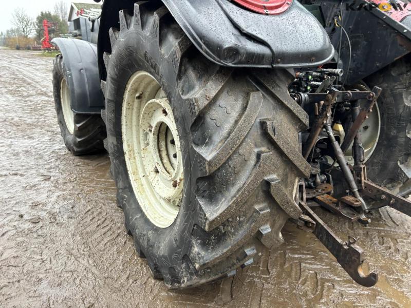 Valtra T150 tractor with front loader 82