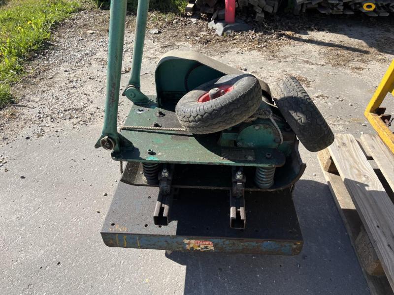Roadside tractor bracket for plate vibrator 10