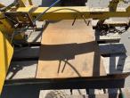 Roadside tractor bracket for plate vibrator 18