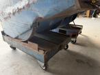 Tilting container 10