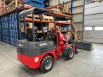 WOLF WL800E mini loader with pallet forks and bucket and charging station 3