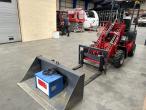 WOLF WL800E mini loader with pallet forks and bucket and charging station 7