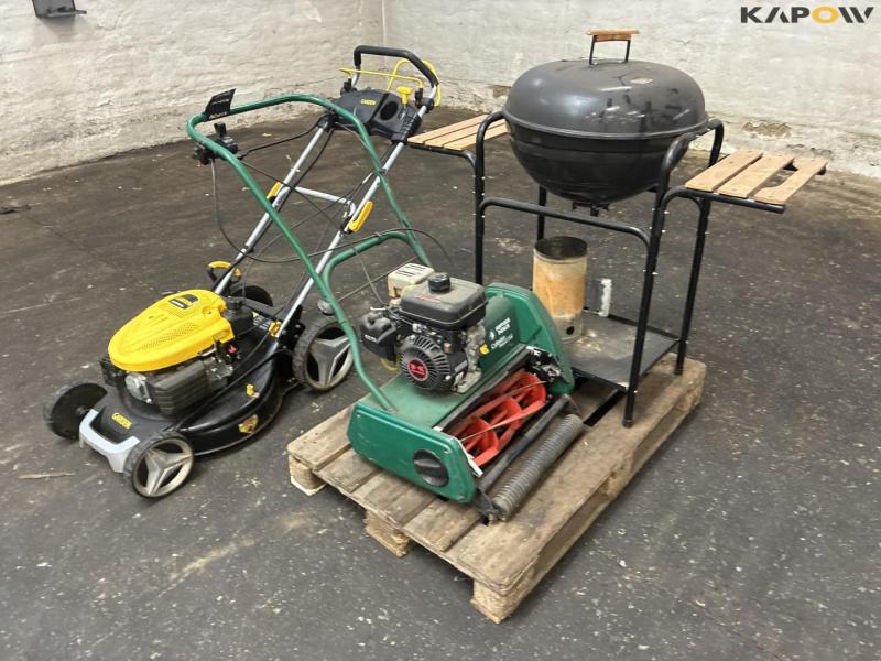 2 lawn mowers and grill 1