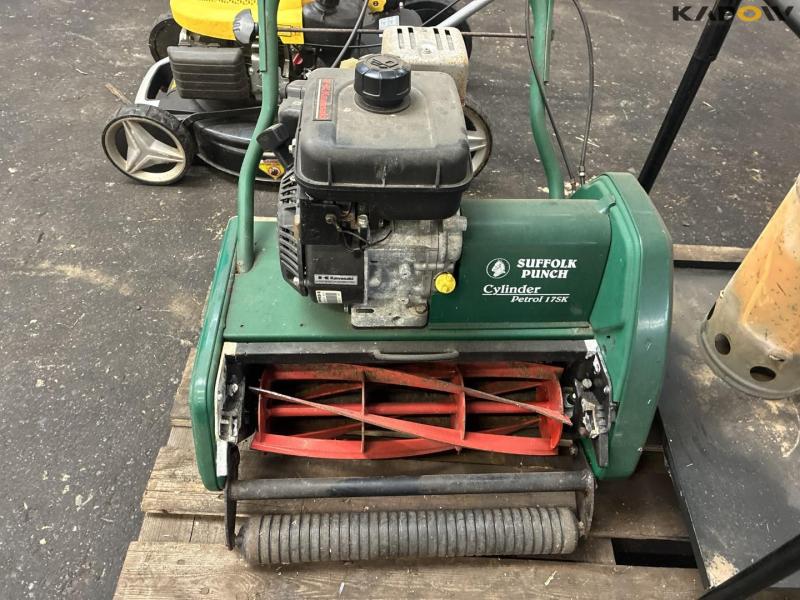 2 lawn mowers and grill 9