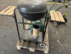 2 lawn mowers and grill 28