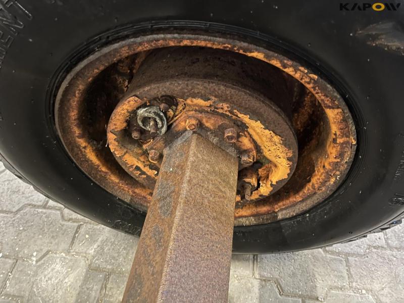 Axle with 14.0/65-16 13