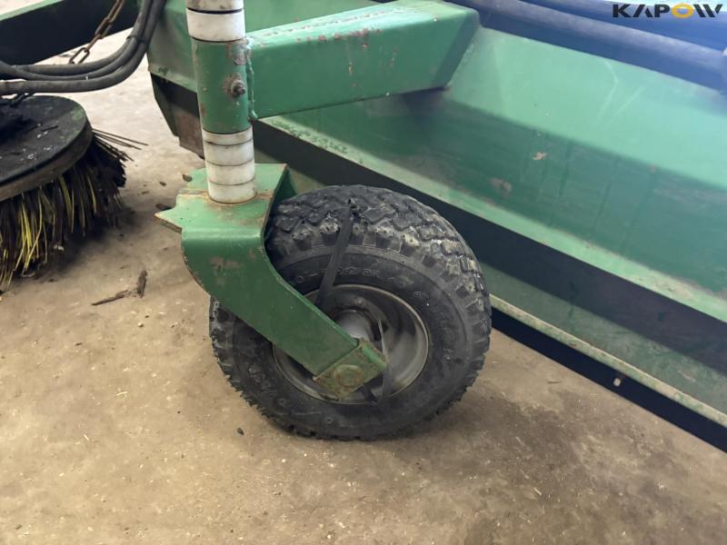 Avant sweeper with collector 10