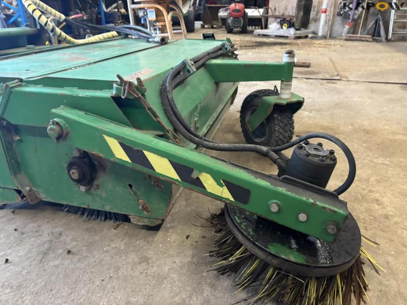 Avant sweeper with collector 15