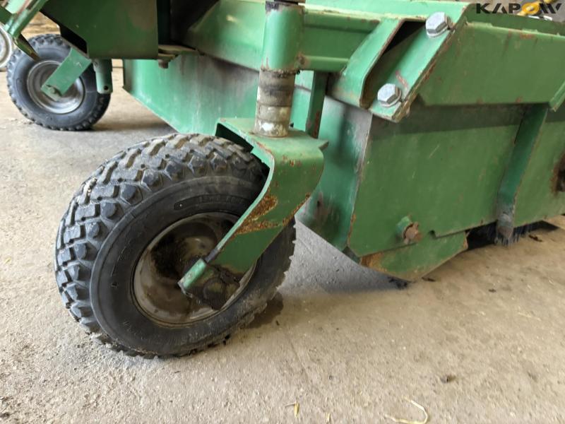 Avant sweeper with collector 18