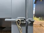 Container for hook and wire 26