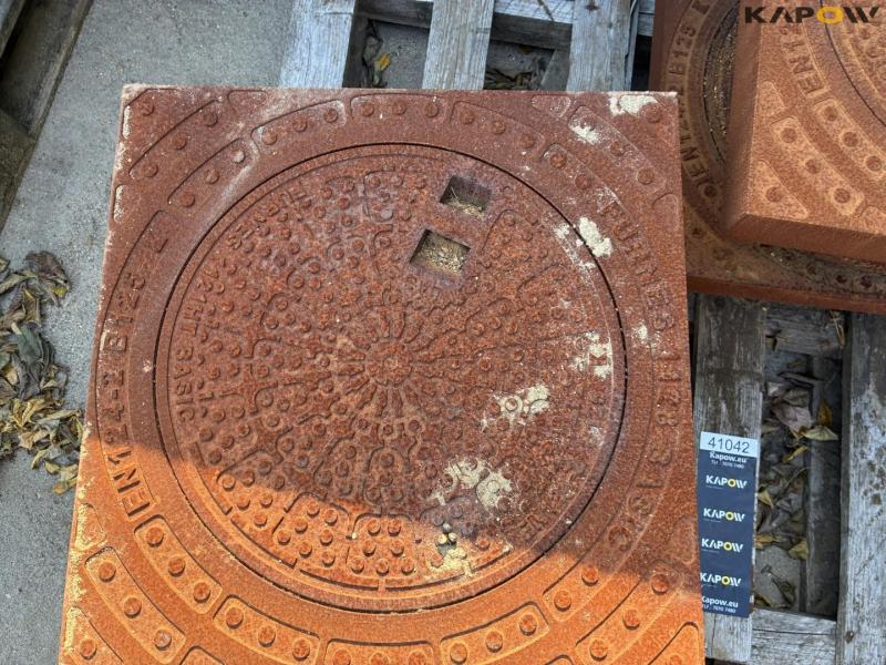 Square manhole frame with round cast iron covers 22