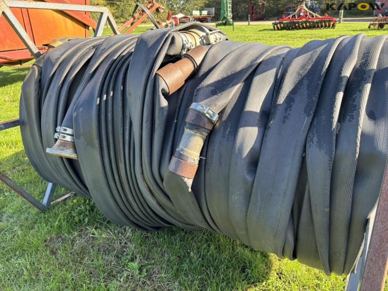Hydraulic feed hose reel 24