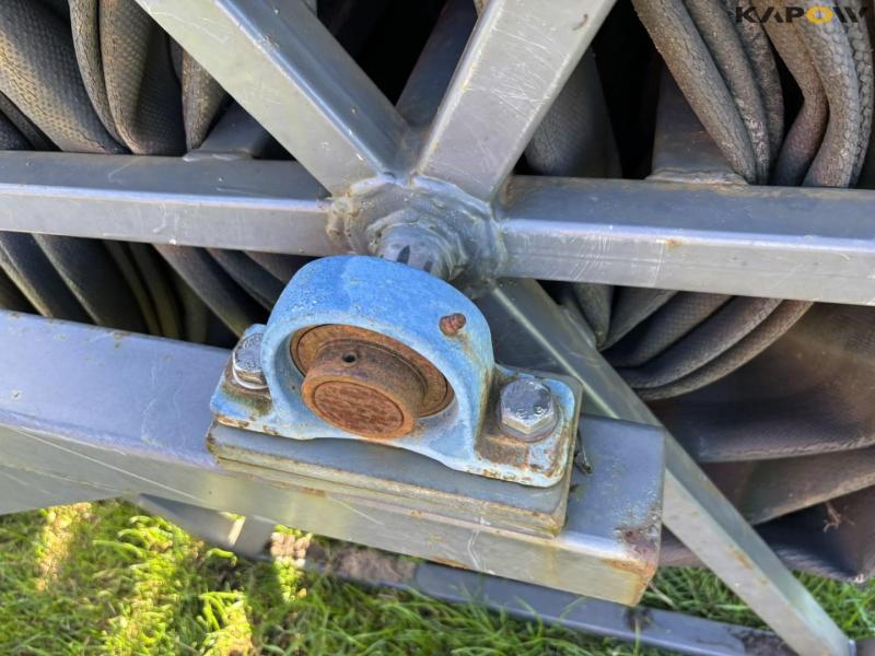Hydraulic feed hose reel 29