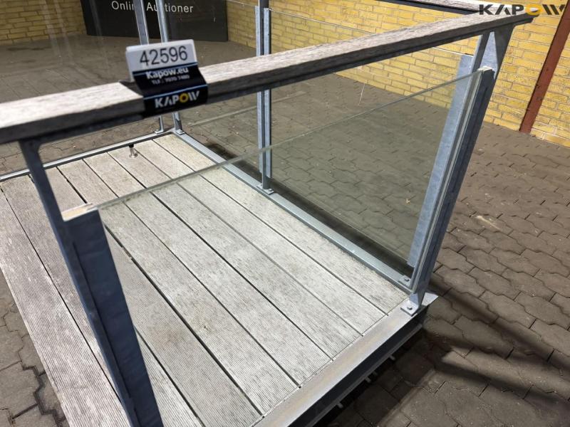 Glass balcony with teak wood bottom 17
