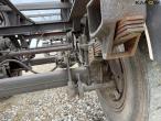 Straw wagon with hydraulic bale securing 20