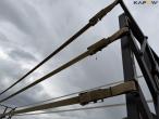 Straw wagon with hydraulic bale securing 34