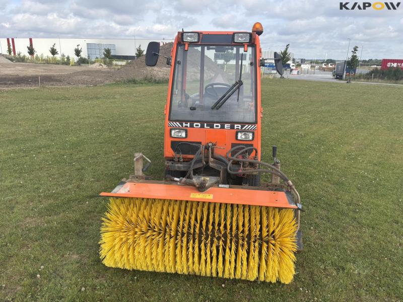 Holder C 2.34 with sweeper and salt spreader 2