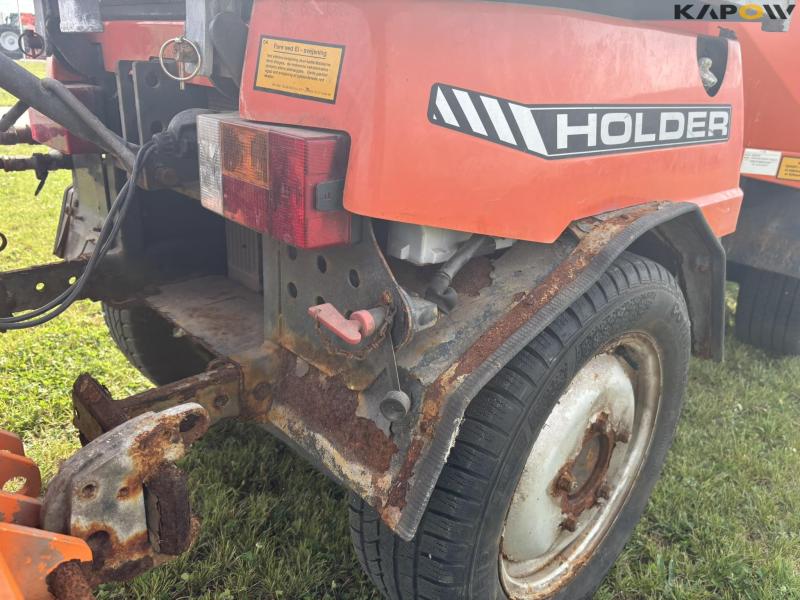 Holder C 2.34 with sweeper and salt spreader 47