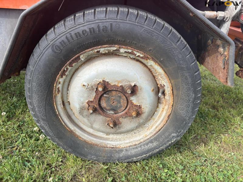 Holder C 2.34 with sweeper and salt spreader 67