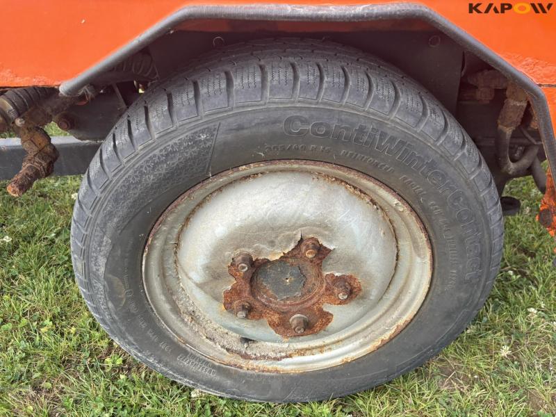 Holder C 2.34 with sweeper and salt spreader 78