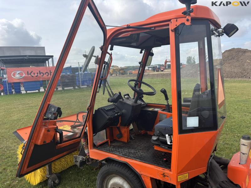 Holder C 2.34 with sweeper and salt spreader 85