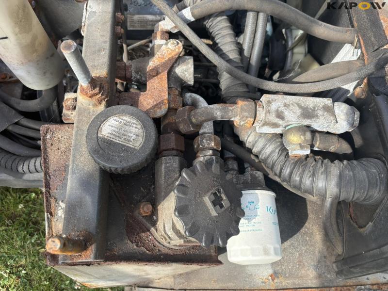 Holder C 2.34 with sweeper and salt spreader 97