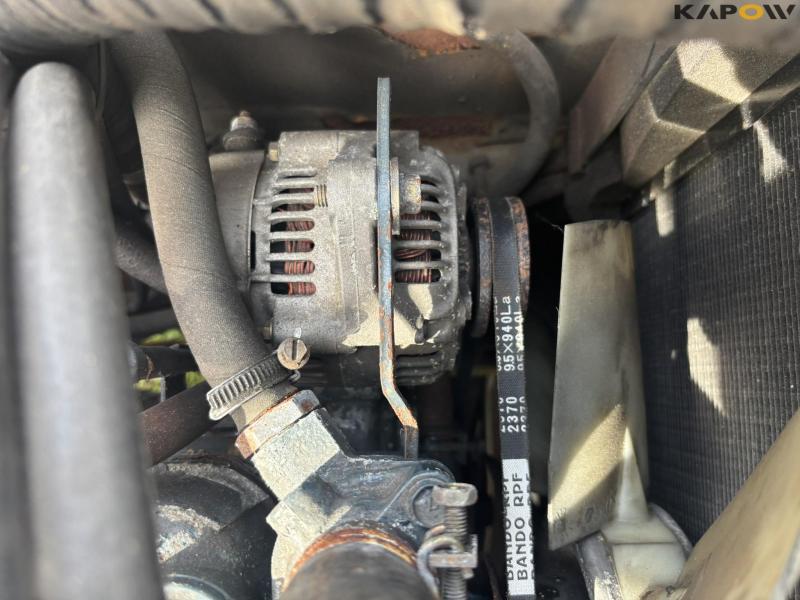 Holder C 2.34 with sweeper and salt spreader 106