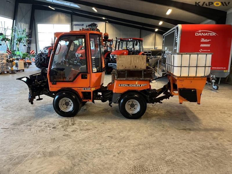 Holder C 2.42 tool carrier with snow plow and salt spreader 8