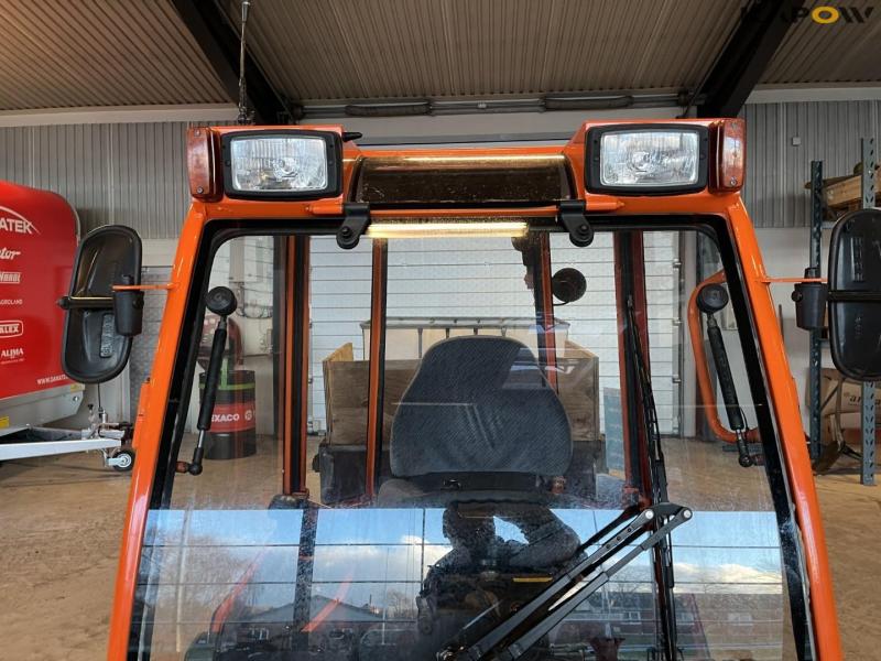 Holder C 2.42 tool carrier with snow plow and salt spreader 14