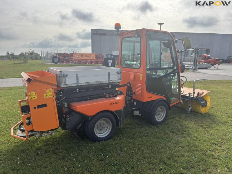 Holder X45 with sweeper and salt spreader 5