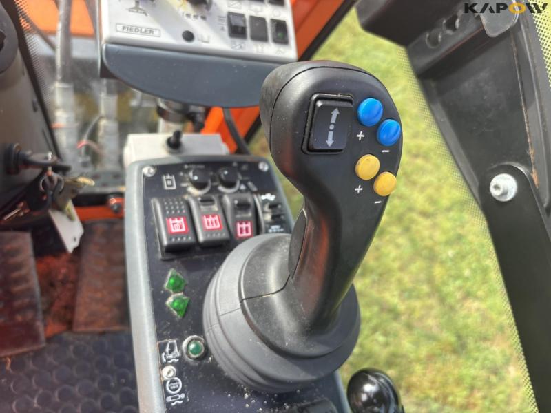 Holder X45 with sweeper and salt spreader 81