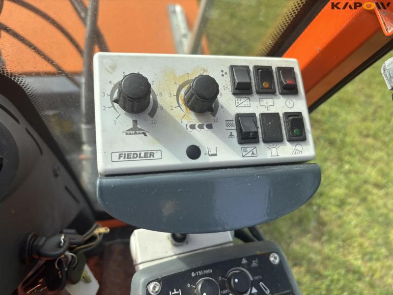 Holder X45 with sweeper and salt spreader 82