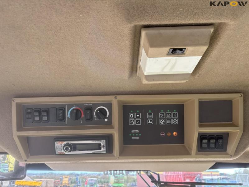 John Deere 7700 forage harvester with corn header and pickup 74