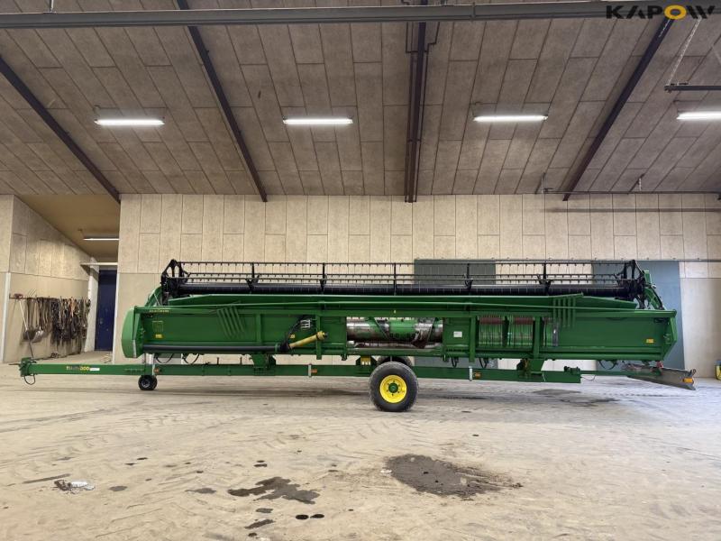 John Deere T660i with 30 foot header 69