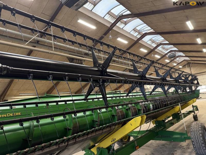 John Deere T660i with 30 foot header 76