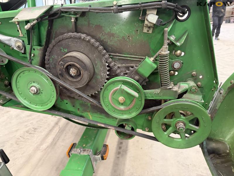 John Deere T660i with 30 foot header 92