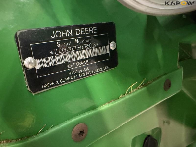 John Deere T660i combine with 30ft draper header 108