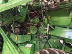 John Deere T660i combine with 30ft draper header 32