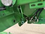 John Deere T660i combine with 30ft draper header 95