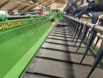John Deere T660i combine with 30ft draper header 115