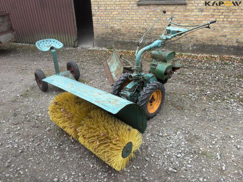 JRUS tool carrier with broom, scraper and sulky 1