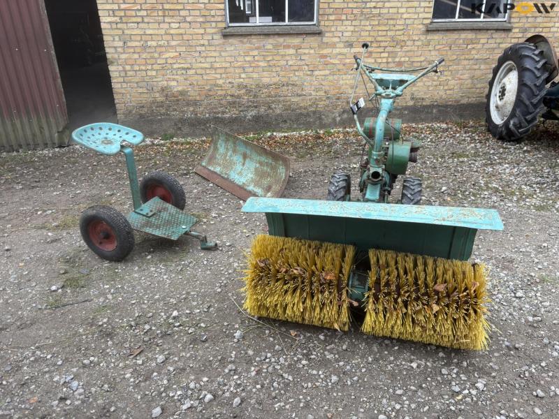 JRUS tool carrier with broom, scraper and sulky 2