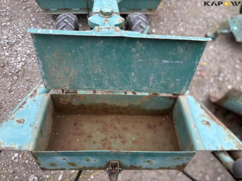 JRUS tool carrier with broom, scraper and sulky 40