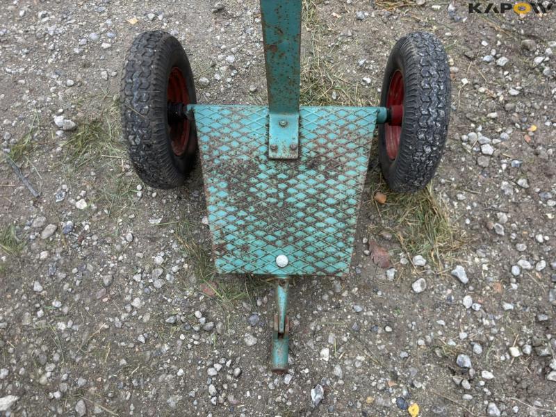 JRUS tool carrier with broom, scraper and sulky 45