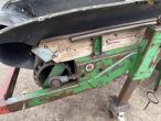 Potato planter with belt spreader 12